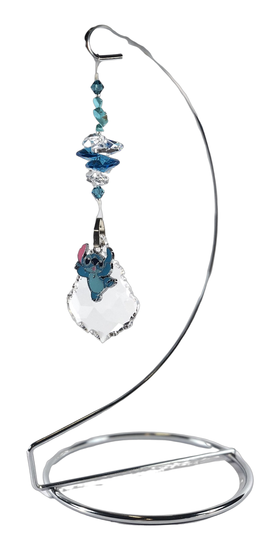 Lilo & Stitch - Stitch crystal suncatcher is decorated with turquoise gemstones and come on this amazing stand.