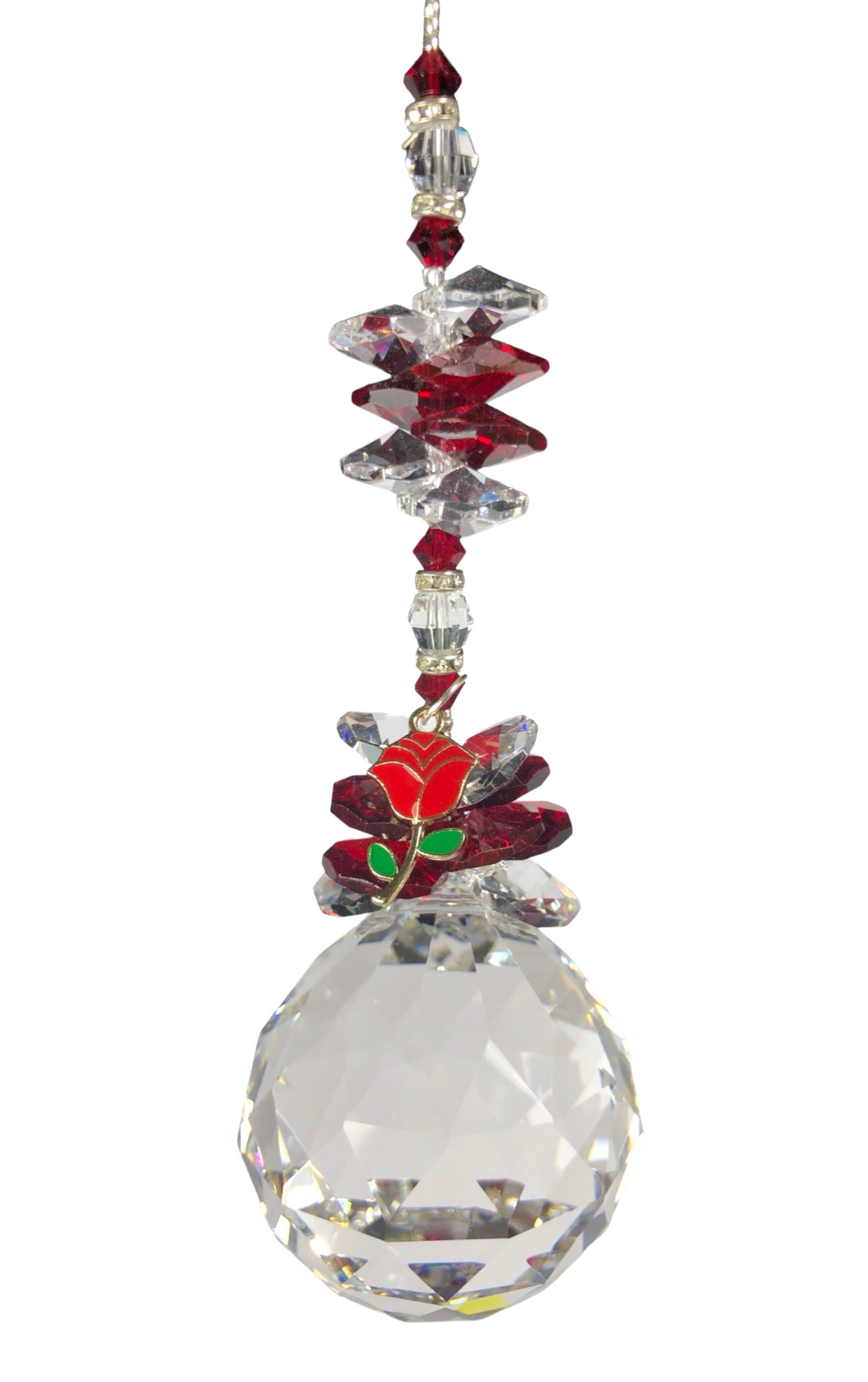 This beautiful Crystal ball suncatcher which is decorated with a Rose and Garnet