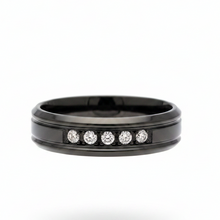 Load image into Gallery viewer, A black band ring featuring five round-cut clear CZ set in a row on the front, photographed against a clean white background.