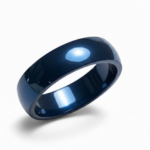 Load image into Gallery viewer, A glossy blue stainless steel band ring with a smooth, rounded profile, shown on a clean white background with a soft shadow underneath.