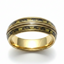 Load image into Gallery viewer, A polished gold band ring featuring a central inlay of black and olive-green, accented by two raised gold grooved bands, shown on a white background.