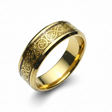 Load image into Gallery viewer, A polished gold stainless steel band ring featuring an engraved Norse-style knotwork and circle pattern on the outer surface, shown on a clean white background.