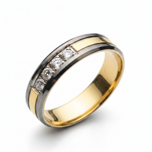 Load image into Gallery viewer, A two-tone metal band ring with a polished yellow gold interior and outer channel, accented by a center row of clear CZ on a white background.