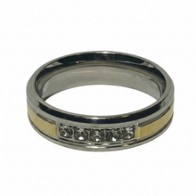 Load image into Gallery viewer, A polished silver-toned metal band ring with a central channel featuring a row of clear CZ and gold-toned inlay sections, shown on a plain white background.