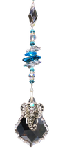 Load image into Gallery viewer, Elephant starburst crystal suncatcher is decorated with aquamarine gemstones.
