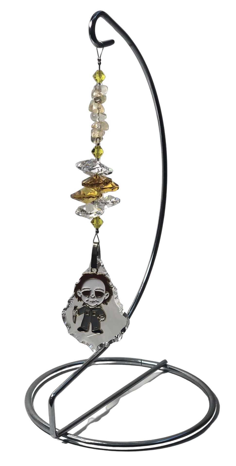 Jason Voorhees crystal suncatcher is decorated with citrine gemstones and come on this amazing large stand