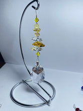 Load image into Gallery viewer, Mother garnet gemstone suncatcher on a medium stand  SH120
