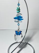 Load image into Gallery viewer, Butterfly crystal with turquoise gemstone hanging on a stand SH1
