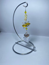 Load image into Gallery viewer, Nana garnet gemstone suncatcher on a medium stand  SH143
