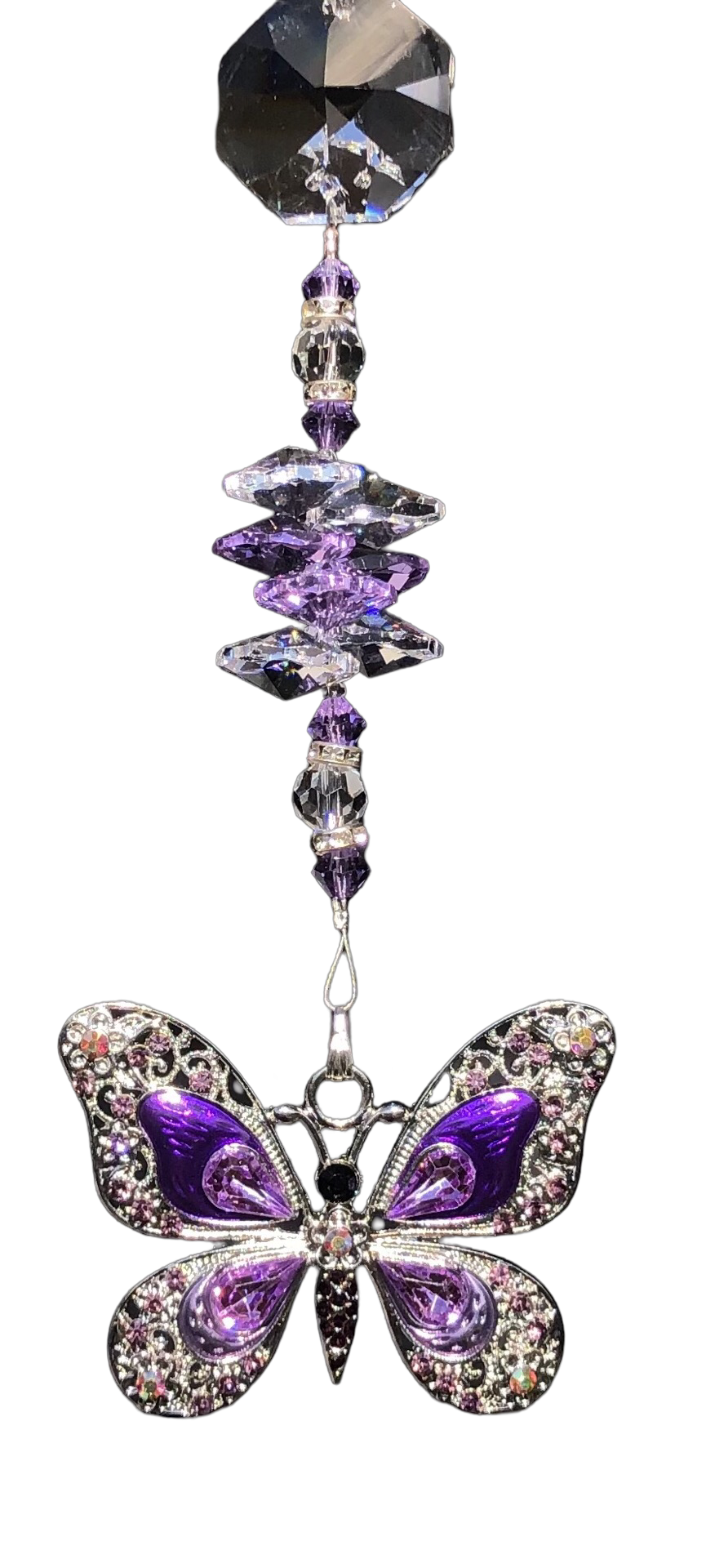 Purple butterfly suncatcher is decorated with crystals and amethyst gemstones.