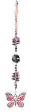 Load image into Gallery viewer, Pink butterfly suncatcher is decorated with crystals and rose quartz gemstones.
