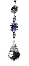 Load image into Gallery viewer, Lotus flower starburst suncatcher is decorated with crystals and lapis lazuli gemstones.
