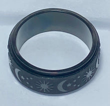 Load image into Gallery viewer, Fidget ring - black ring with  stars and moons spinner.  Sizes 6, 7, 8, 9, 10, 11. Measures 8mm FR102
