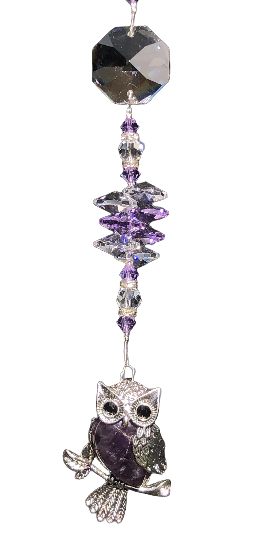 Purple owl suncatcher is decorated with crystals and amethyst gemstones