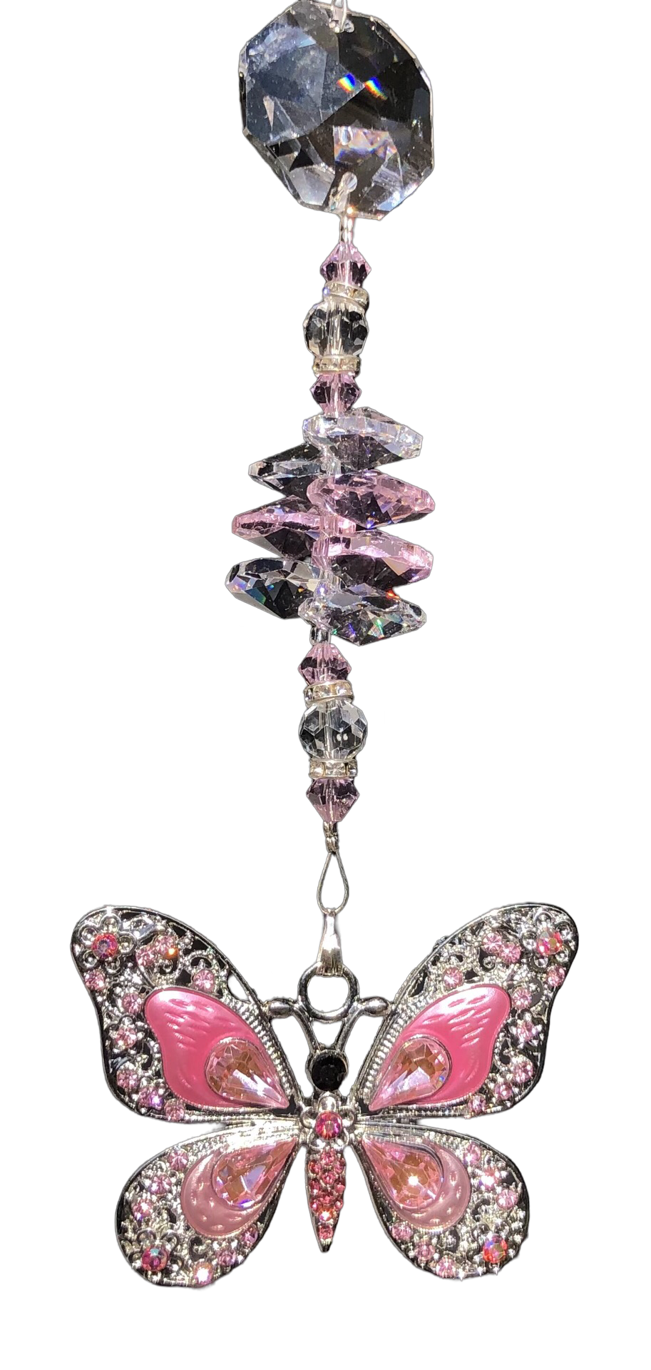 Pink butterfly suncatcher is decorated with crystals and rose quartz gemstones.