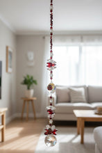 Load image into Gallery viewer, 30mm Crystal Ball Suncatcher decorated with ladybirds and garnet gemstones CH472
