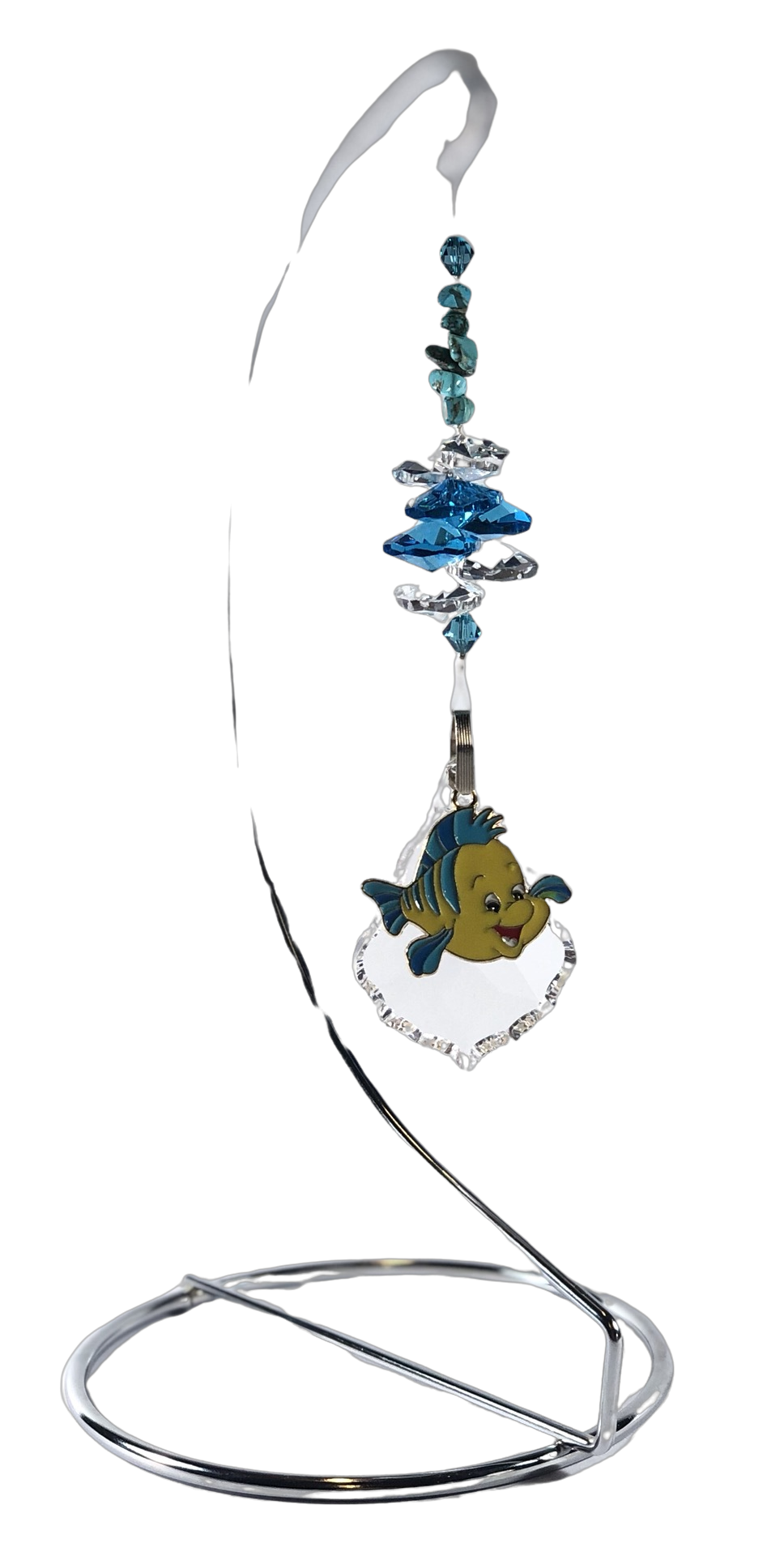 The Little Mermaid - Flounder crystal suncatcher is decorated with turquoise gemstones and come on this amazing stand.