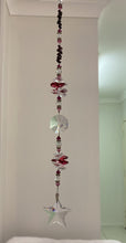 Load image into Gallery viewer, Crystal Star Suncatcher decorated with garnet gemstones CH457

