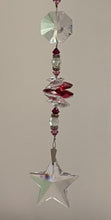 Load image into Gallery viewer, Crystal Star Suncatcher decorated with garnet gemstones CH457
