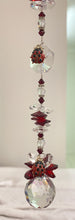 Load image into Gallery viewer, 30mm Crystal Ball Suncatcher decorated with ladybirds and garnet gemstones CH472
