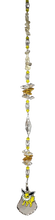 Load image into Gallery viewer, Pokémon Eevee evolution - Jolteon crystal suncatcher, decorated with 50mm starburst crystal and citrine gemstone.
