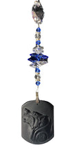 Load image into Gallery viewer, Carved Wolf suncatcher is decorated with crystals and Lapis Lazuli gemstones
