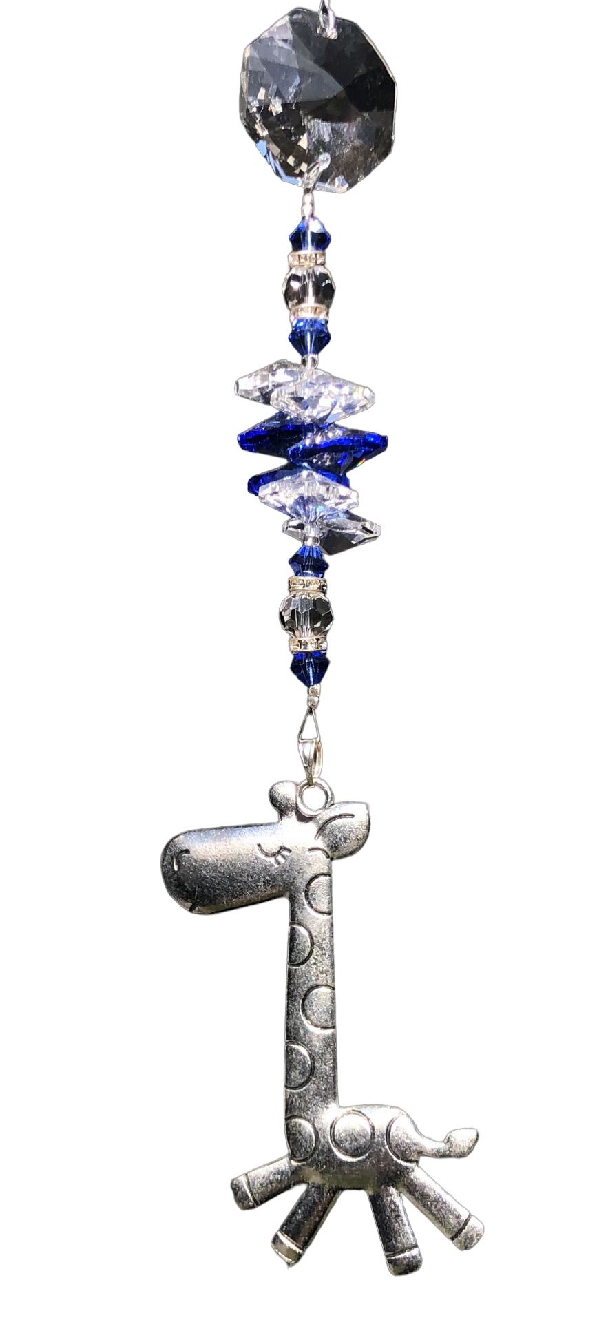 Giraffe suncatcher is decorated with crystals and lapis lazuli gemstones.