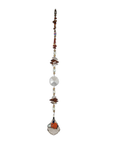 Load image into Gallery viewer, Chainsaw Man - Pochita crystal suncatcher, decorated with 50mm Starburst crystal and carnelian gemstone.

