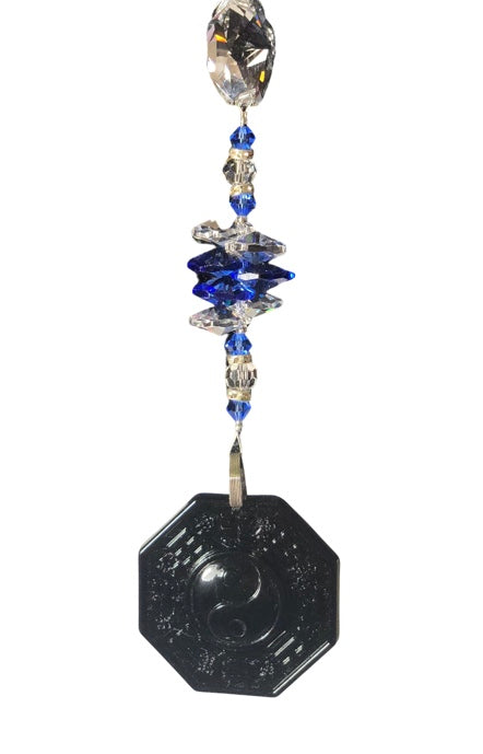 Carved Yin & Yan Bagua suncatcher is decorated with crystals and Lapis Lazuli gemstones