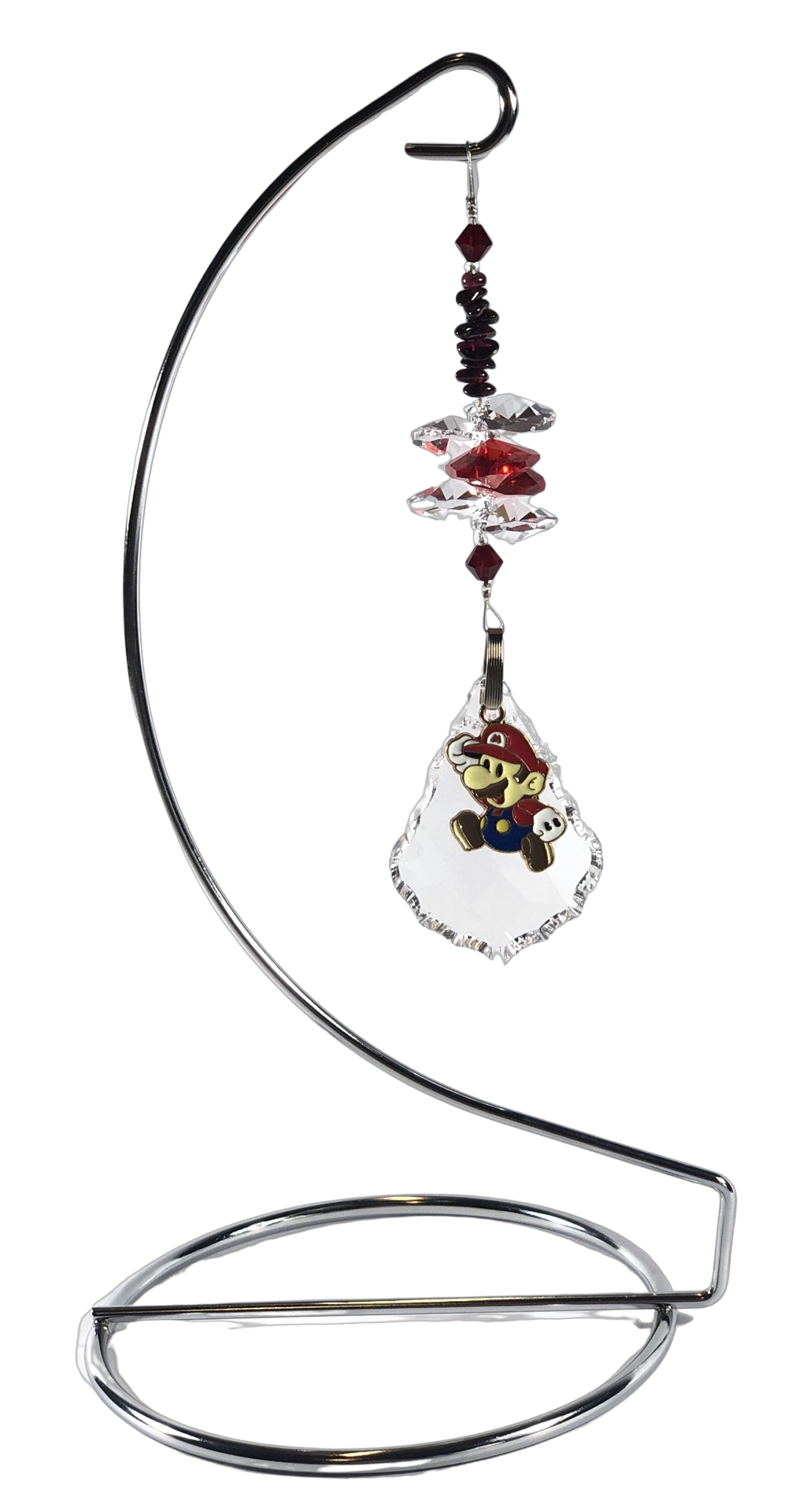 Mario - crystal suncatcher is decorated with garnet gemstones and come on this amazing stand.