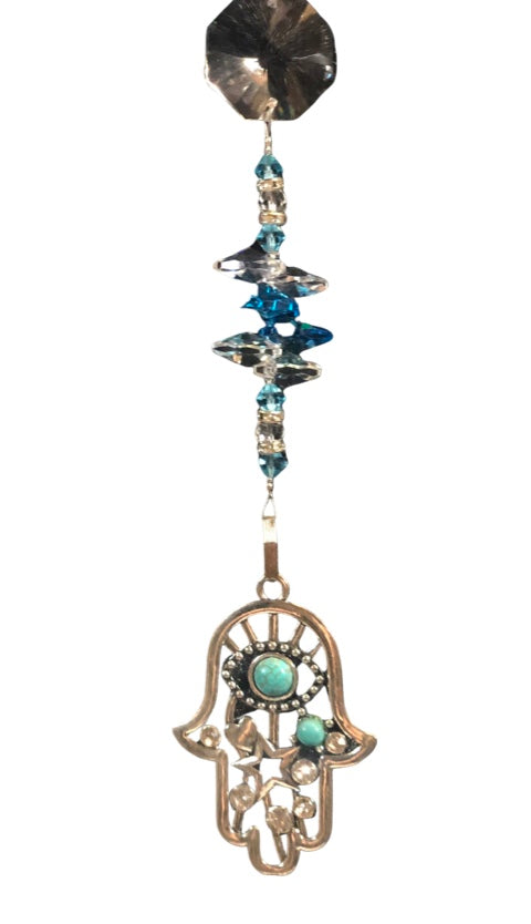 Hand of Fatima suncatcher which is decorated with crystals and Turquoise