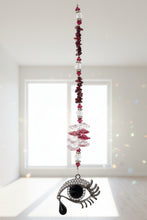 Load image into Gallery viewer, Eye Crystal Suncatcher decorated with Lapis Lazuli gemstones CH89
