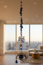 Load image into Gallery viewer, Eye Crystal Suncatcher decorated with Lapis Lazuli gemstones CH89
