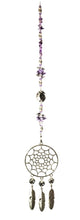 Load image into Gallery viewer, Dreamcatcher suncatcher is decorated with crystals and Amethyst gemstones
