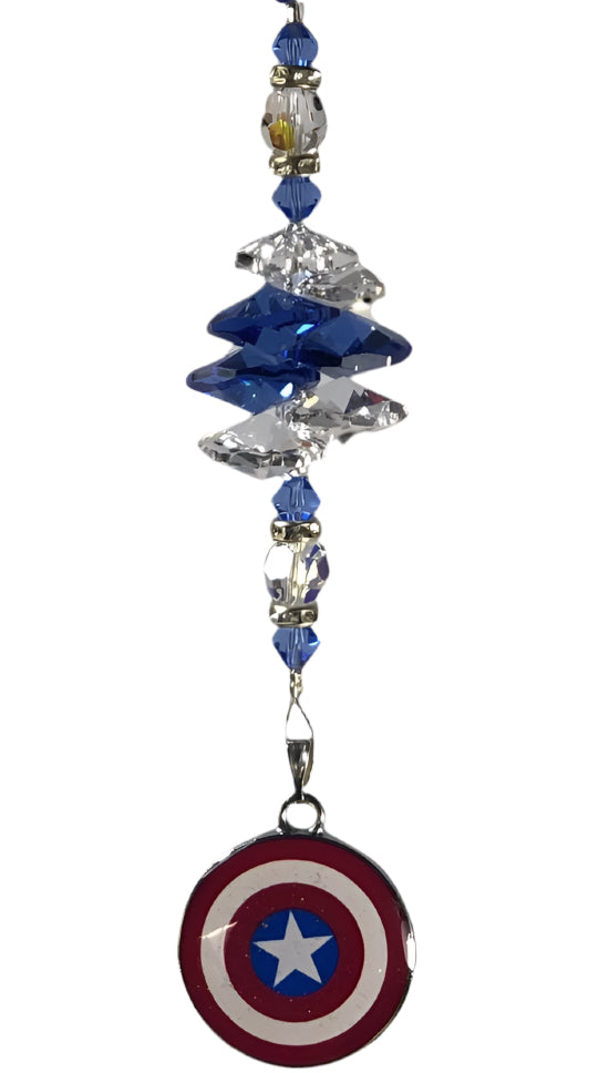 Character crystal suncatcher is decorated with lapis lazuli gemstone.