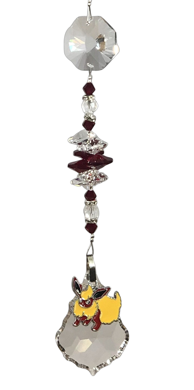 Pokémon Eevee  evolution - Flareon crystal suncatcher, decorated with 50mm starburst crystal and garnet gemstone.