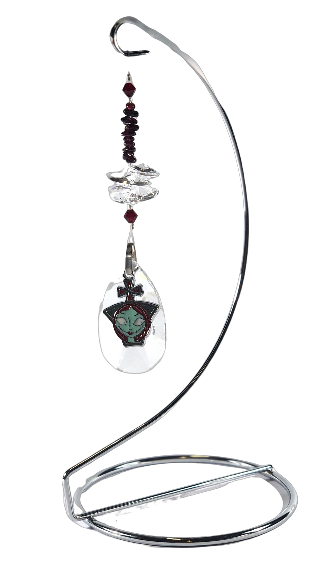 A Nightmare Before Christmas - Sally crystal suncatcher is decorated with garnet gemstones and come on this amazing stand.