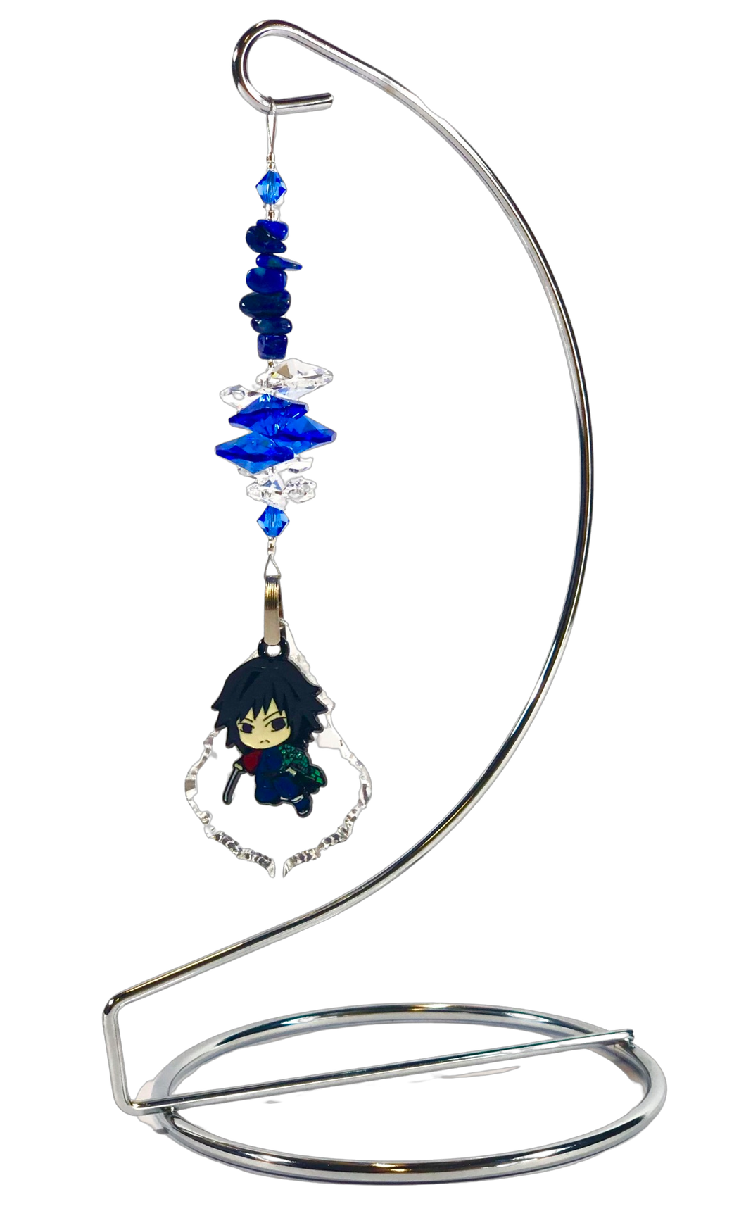 Demon Slayer - Giyu Tomioka crystal suncatcher is decorated with lapis lazuli gemstones and come on this amazing stand.