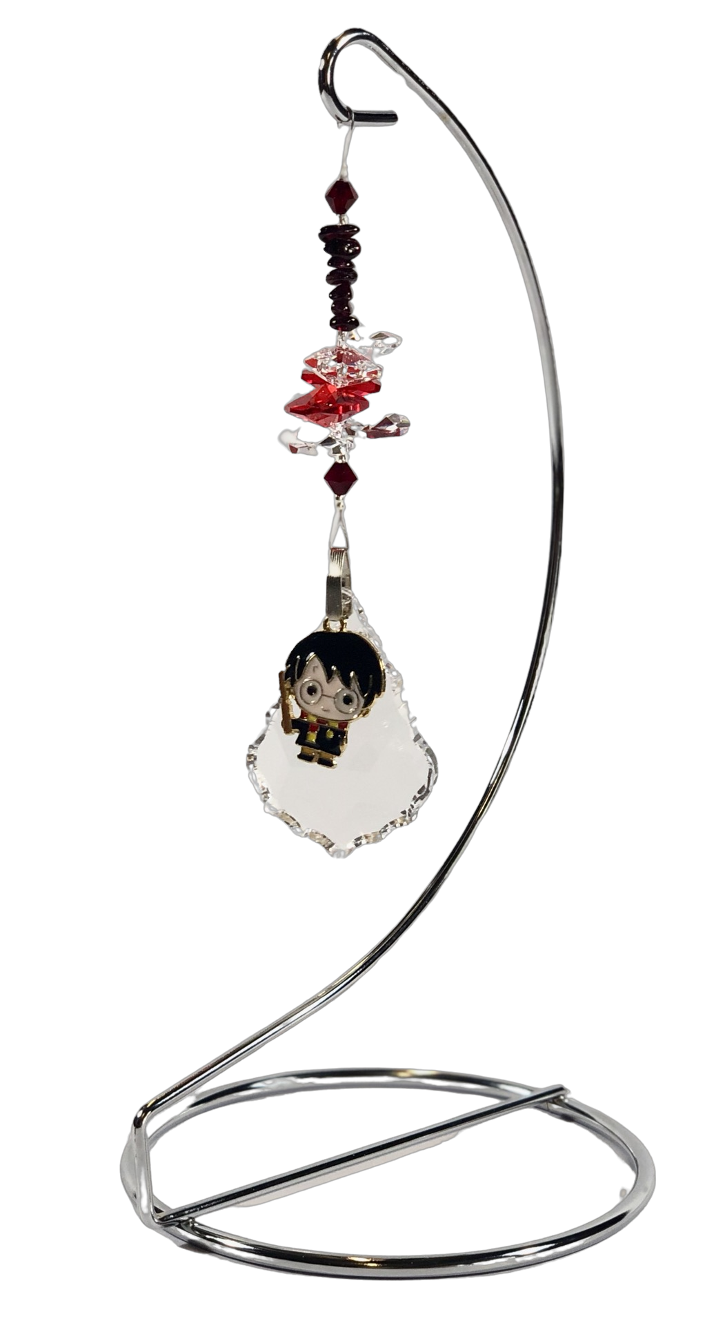 Harry Potter - crystal suncatcher is decorated with garnet gemstones and come on this amazing stand.