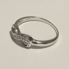 Load image into Gallery viewer, Sterling silver CZ Infinity ring.  Sizes 5, 6, 10. SD05
