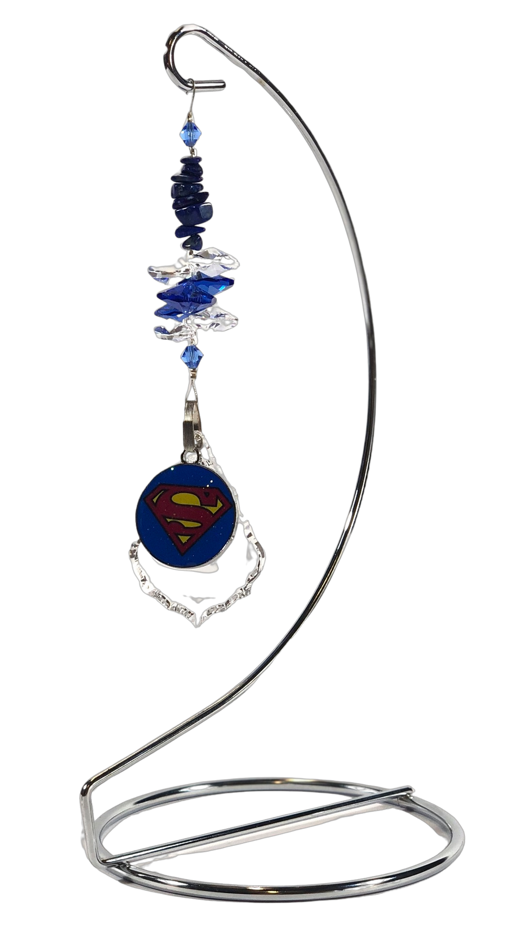 Superman - DC Comics crystal suncatcher is decorated with lapis lazuli gemstones and come on this amazing stand.