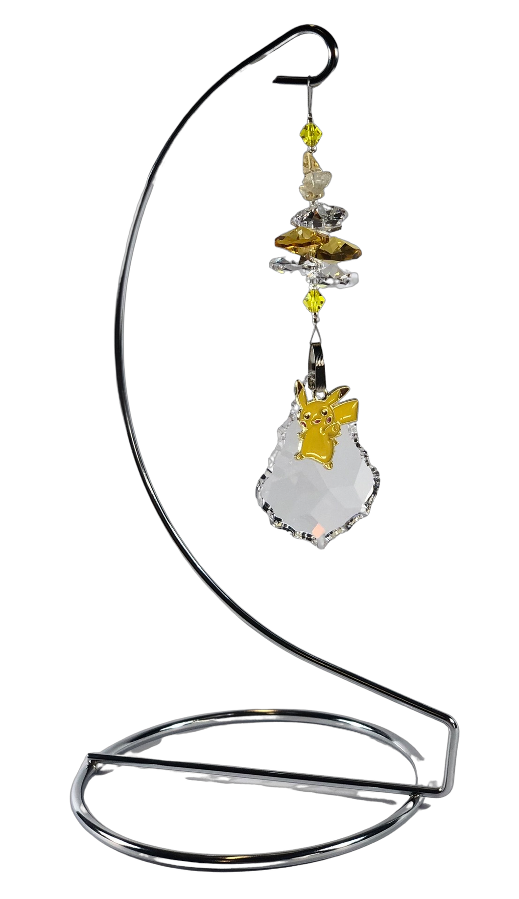 Pokémon - Pikachu crystal suncatcher is decorated with citrine gemstones and come on this amazing stand.