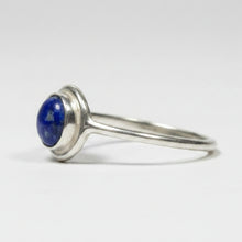 Load image into Gallery viewer, Sterling Silver ring with a lapis lazuli gemstone on a white background
