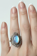 Load image into Gallery viewer, sterling silver filigree ring with an oval white moonstone cabochon
