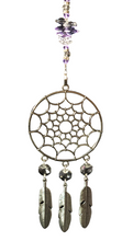 Load image into Gallery viewer, Dreamcatcher suncatcher is decorated with crystals and Amethyst gemstones
