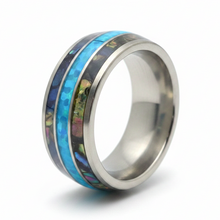 Load image into Gallery viewer, A silver-toned stainless steel ring band featuring two inlay stripes: one with vibrant blue iridescent opal and one with darker blue and green iridescent abalone shell, shown on a white background.
