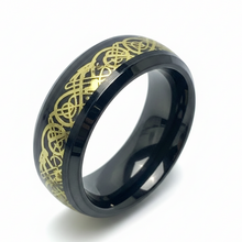 Load image into Gallery viewer, A black stainless steel ring with a gold pattern.
