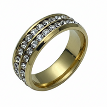 Load image into Gallery viewer, A gold band ring featuring two parallel rows of clear round-cut rhinestones, shown on a plain white background.
