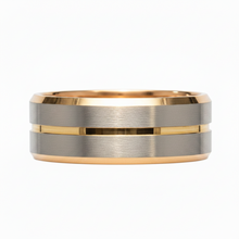 Load image into Gallery viewer, A two-tone metal band ring with brushed silver and polished rose gold edges, shown against a plain white background.
