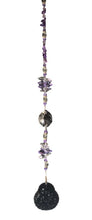 Load image into Gallery viewer, Carved Buddha suncatcher is decorated with crystals and Amethyst gemstones
